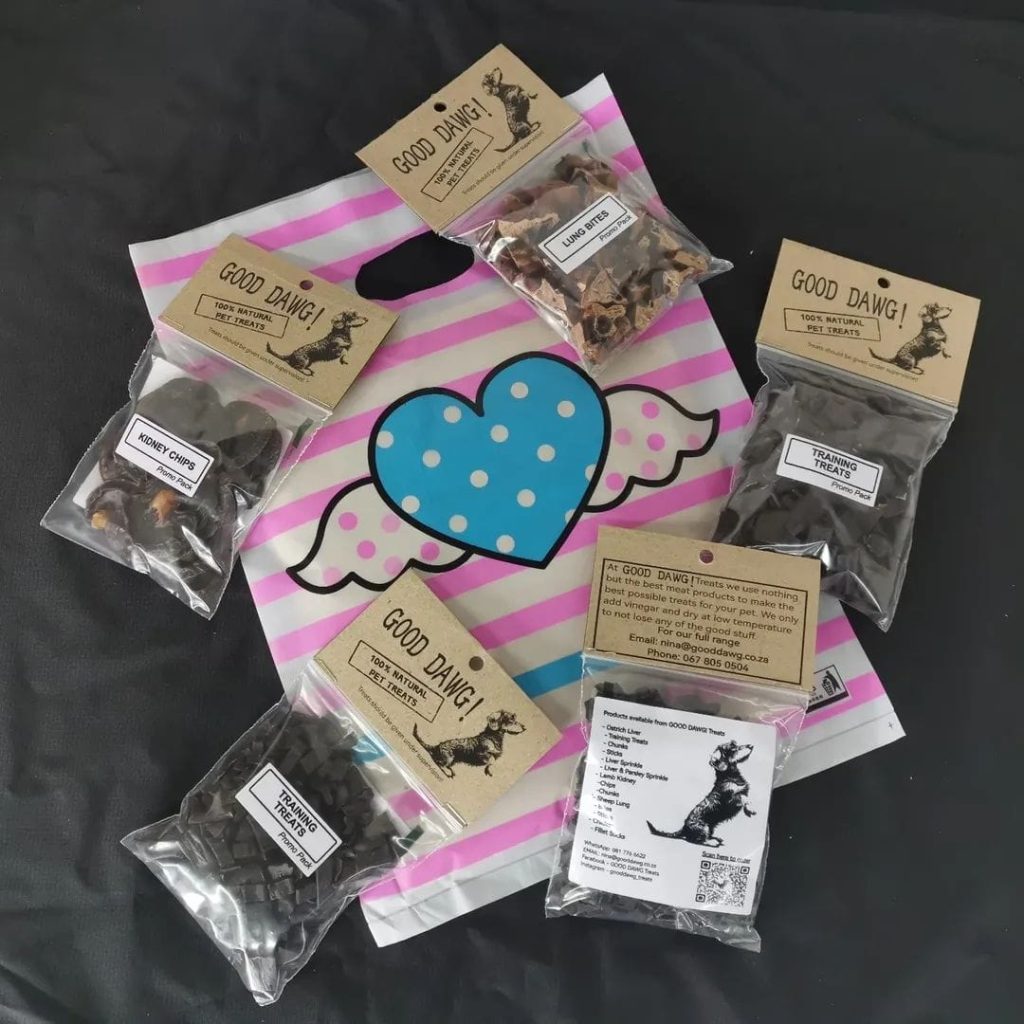 Variety of GoodDawg treats including Ostrich Liver training treats, Lamb Kidney chips, and Sheep Lung bites.